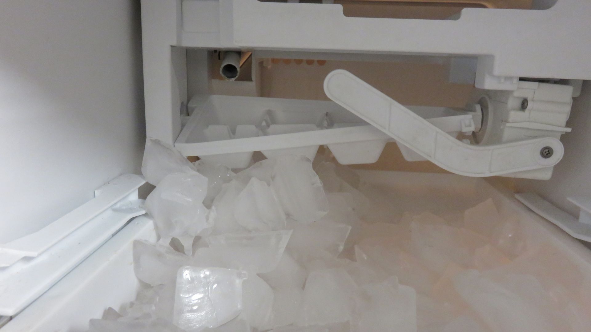 A close up of a shelf with plastic bags on it